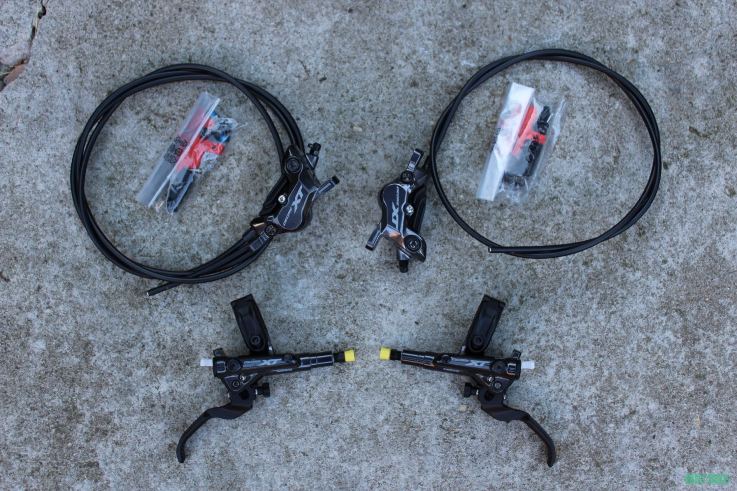 1. Shimano XT BR-M8120-B J-Kit set complet - 4 piston - placute metalice