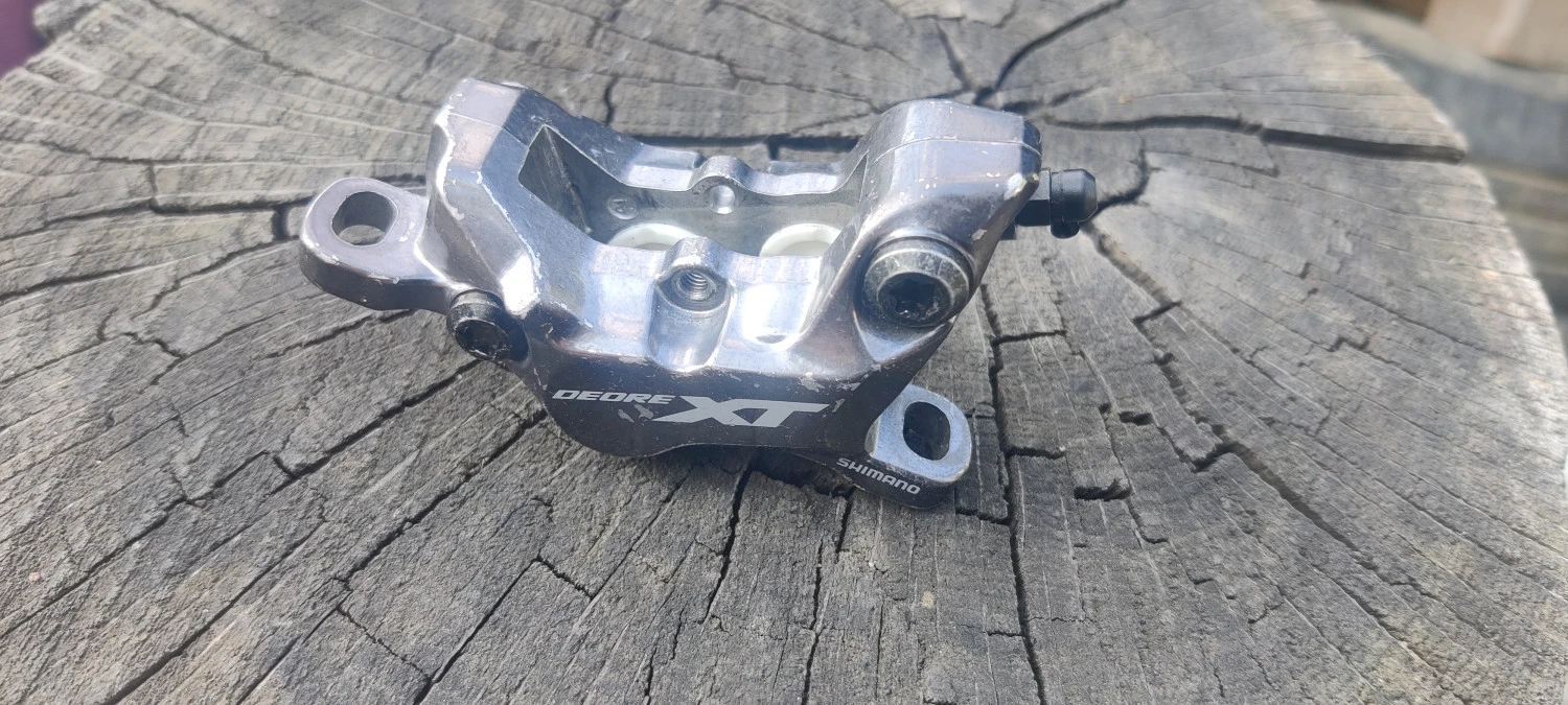 1. Etrier Shimano Deore Xt 4-pistoane
