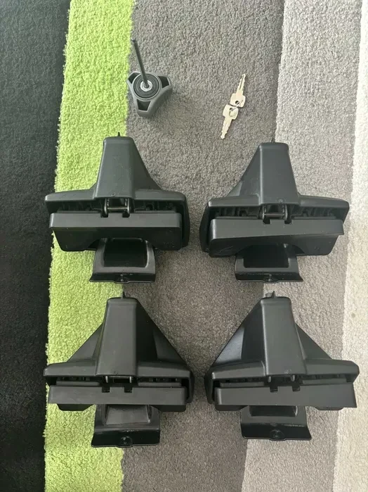 1. Thule evo clamp 7105 + kit 145011 Skoda Octavia