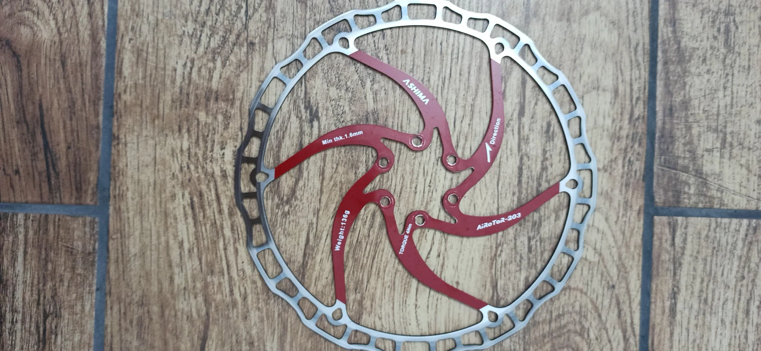 1. Rotor/ disc Ashima 203mm rosu