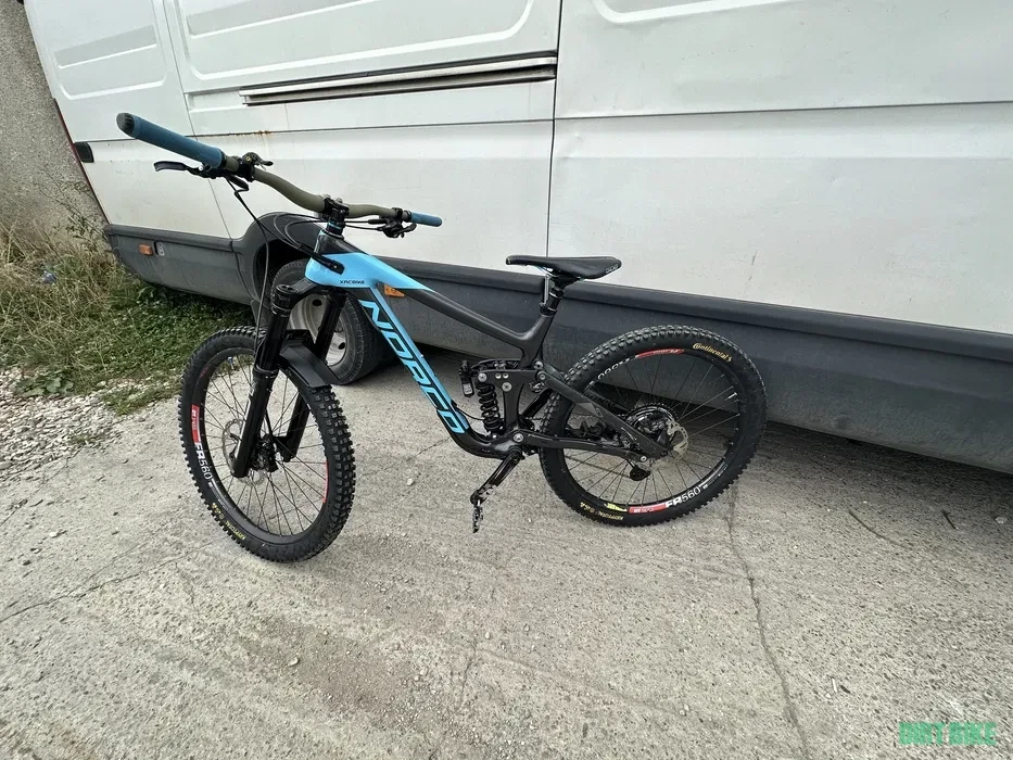 7. Bicicleta norco super enduro piese de top