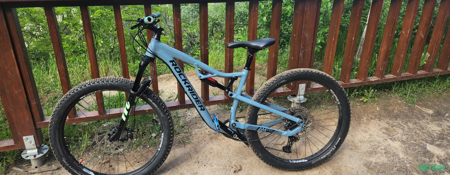7. Bicicleta full suspension rockrider