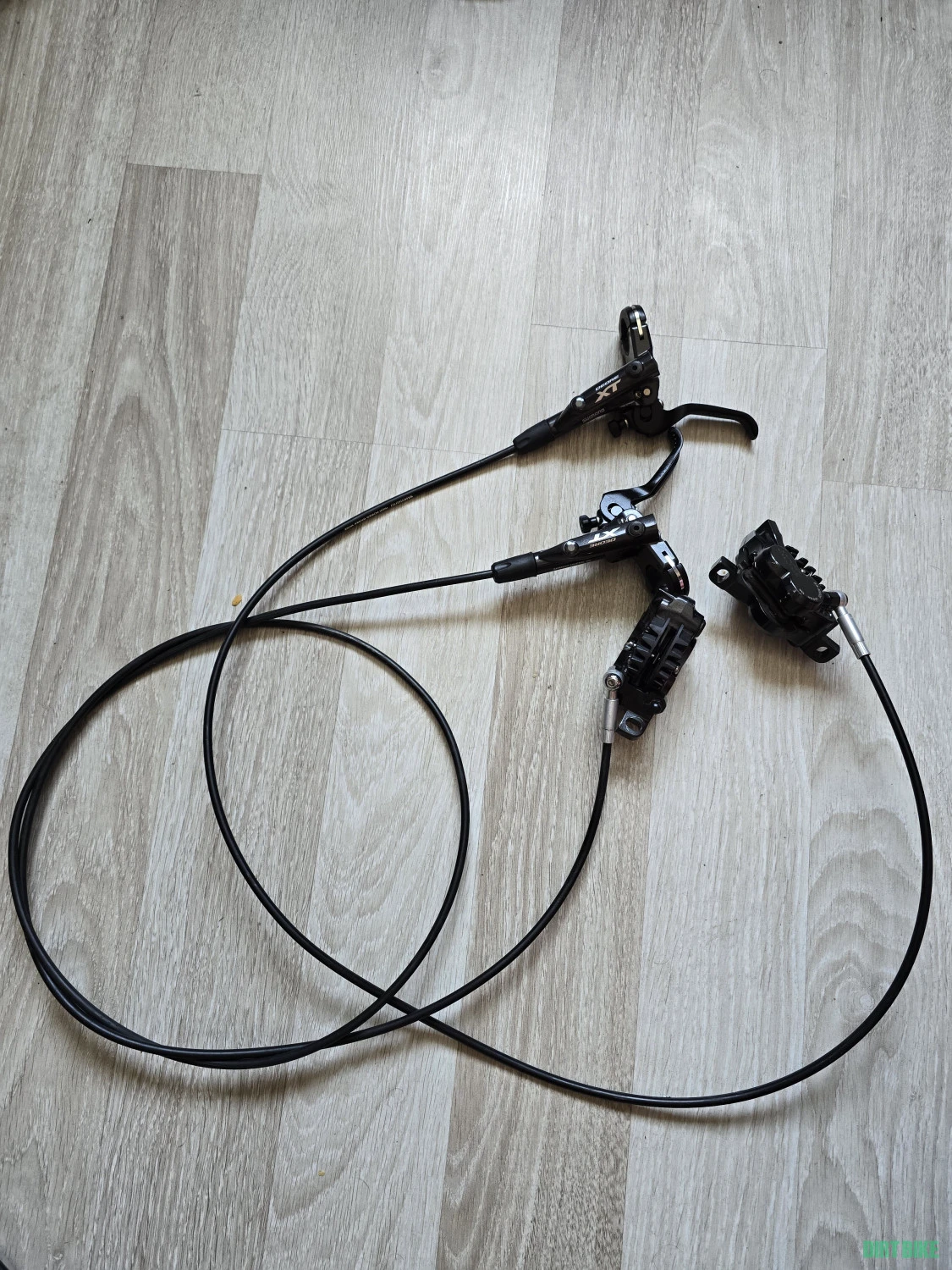 1. Set frane SHIMANO M8120 XT fata+spate plăcuțe