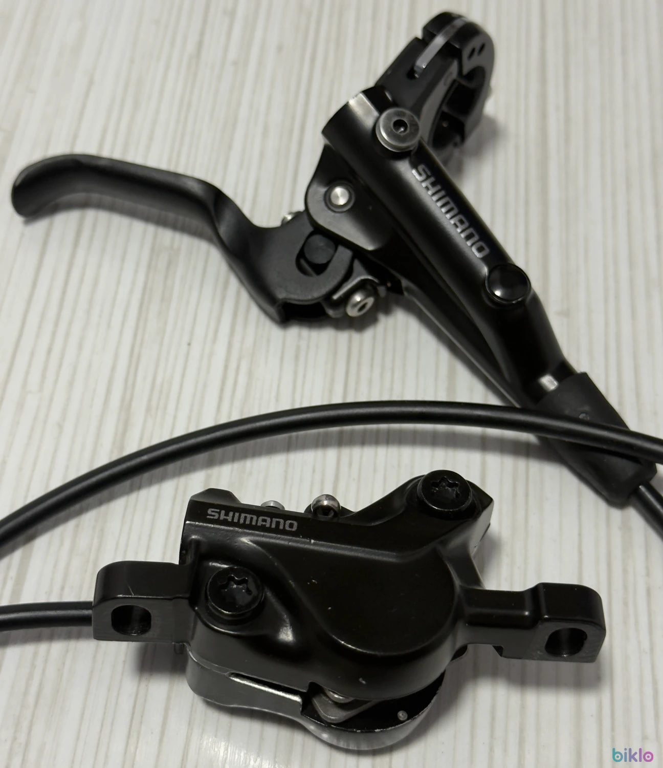 1. Frâne complete Shimano MT501 (față/spate)