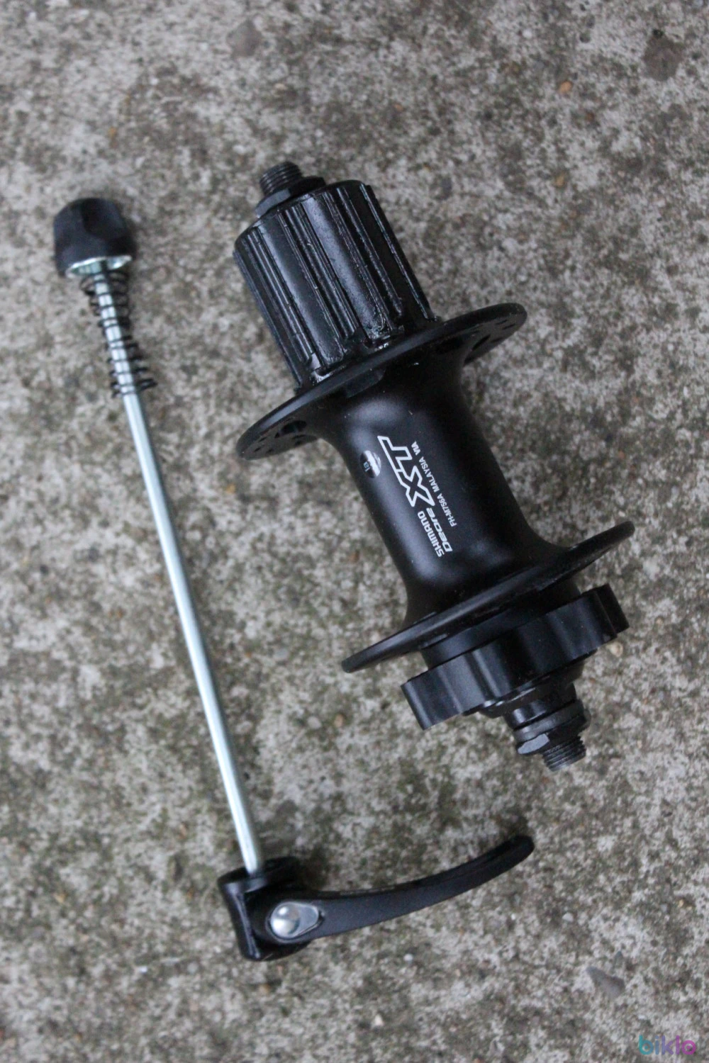 1. Shimano XT FH-M756A Disc butuc spate + QR alu