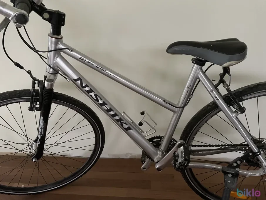 1. Vând bicicletă Nishiki pentru doamne
