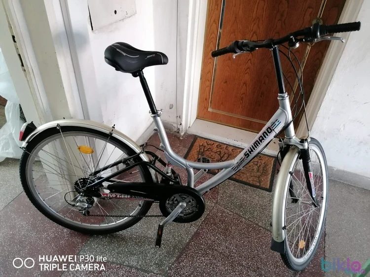 1. Vind bicicleta de dame SHIMANO, roti de 28,numai in ORADEA