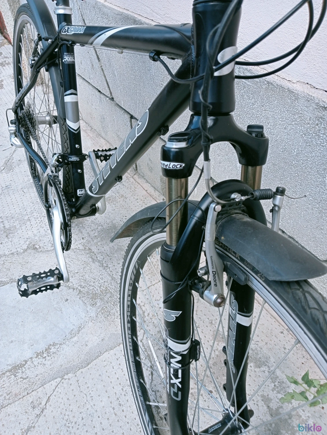 7. Bicicleta oraș treking Stevens Germania 27 V Shimano Deore suspensie Roți 28