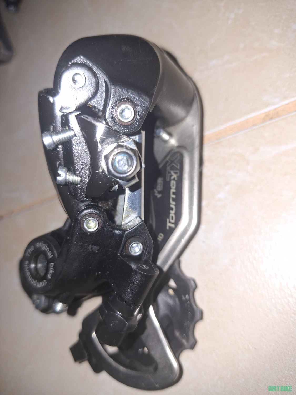 5. Schimbator pinioane Shimano Turney prindere ax
