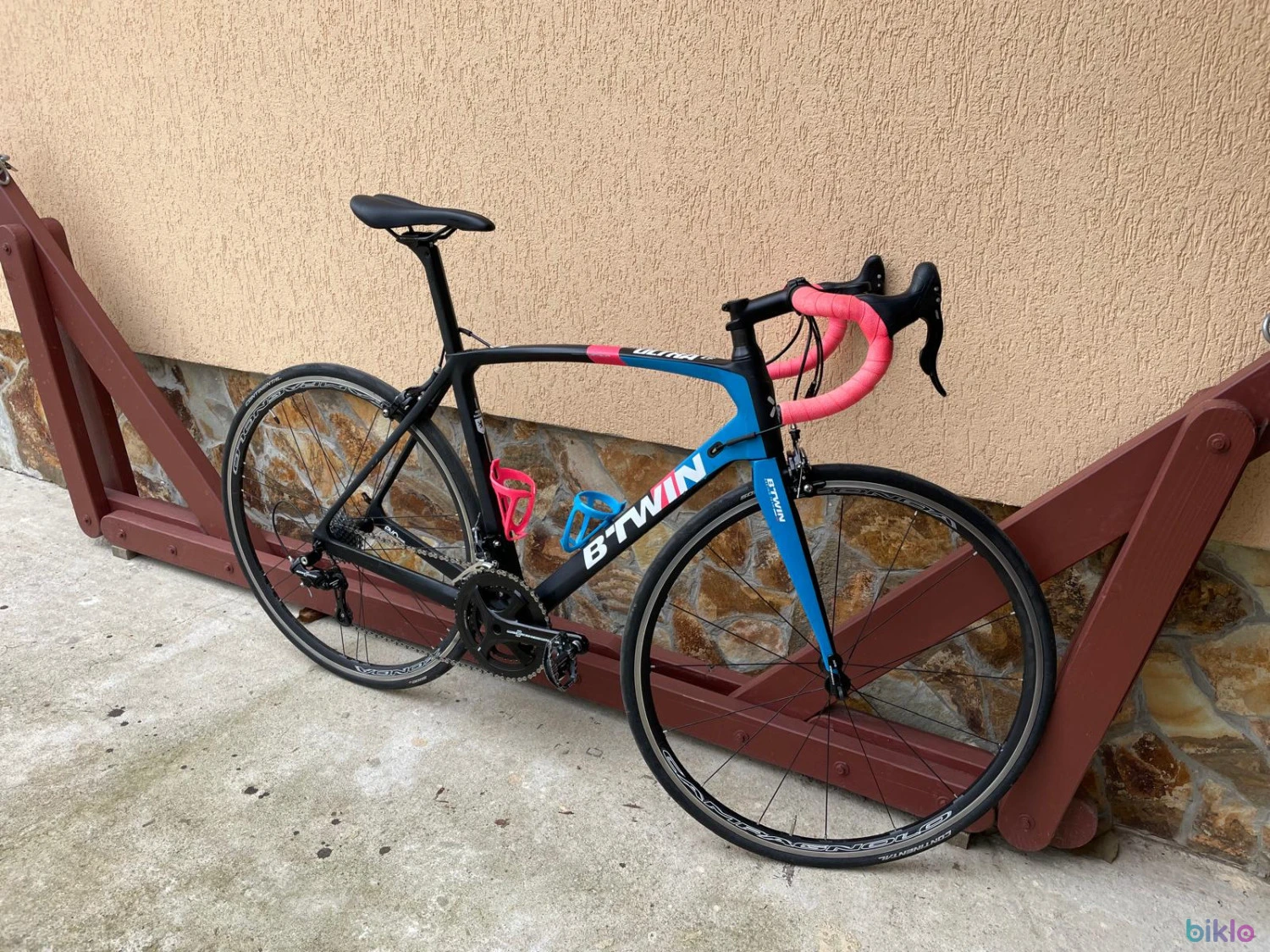7. Bicicleta cursiera BTWIN ULTRA CF, campagnolo potenza 2x11