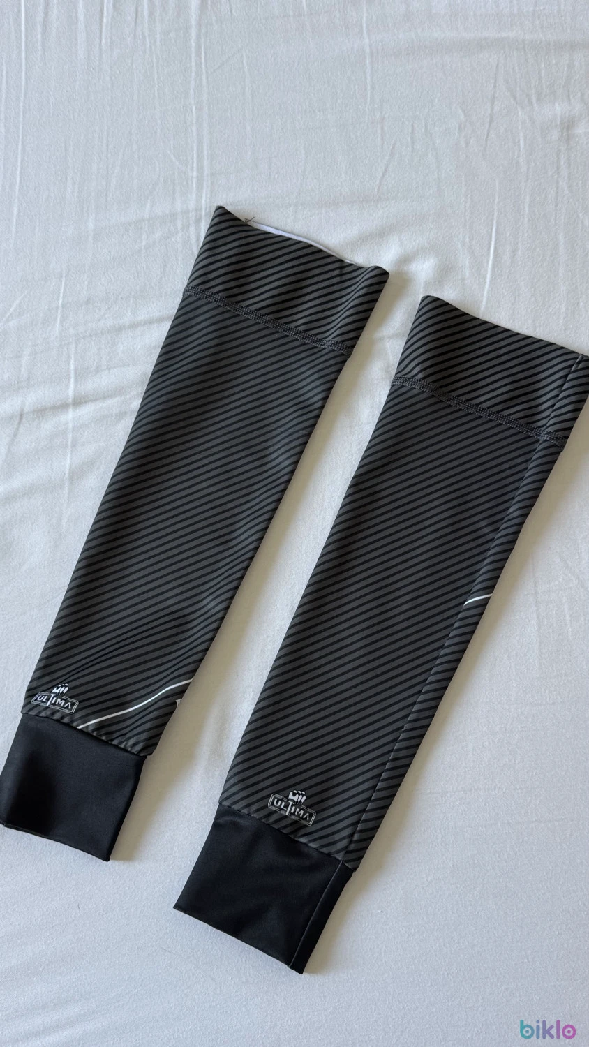 1. Incalzitoare maini ciclism Ultima arm sleeves