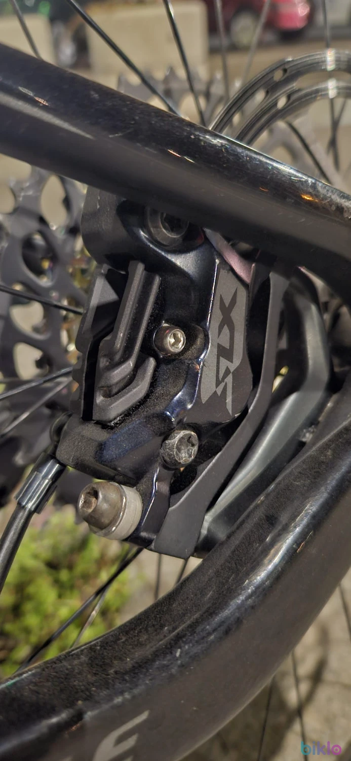 6. Set frâne față-spate Shimano SLX M7120 4-pistoane