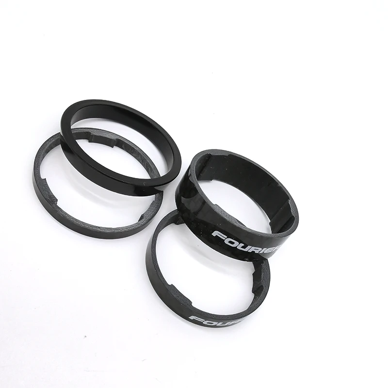 1. Distantier Fouriers Ultra Light, carbon pentru furci, set 4 buc