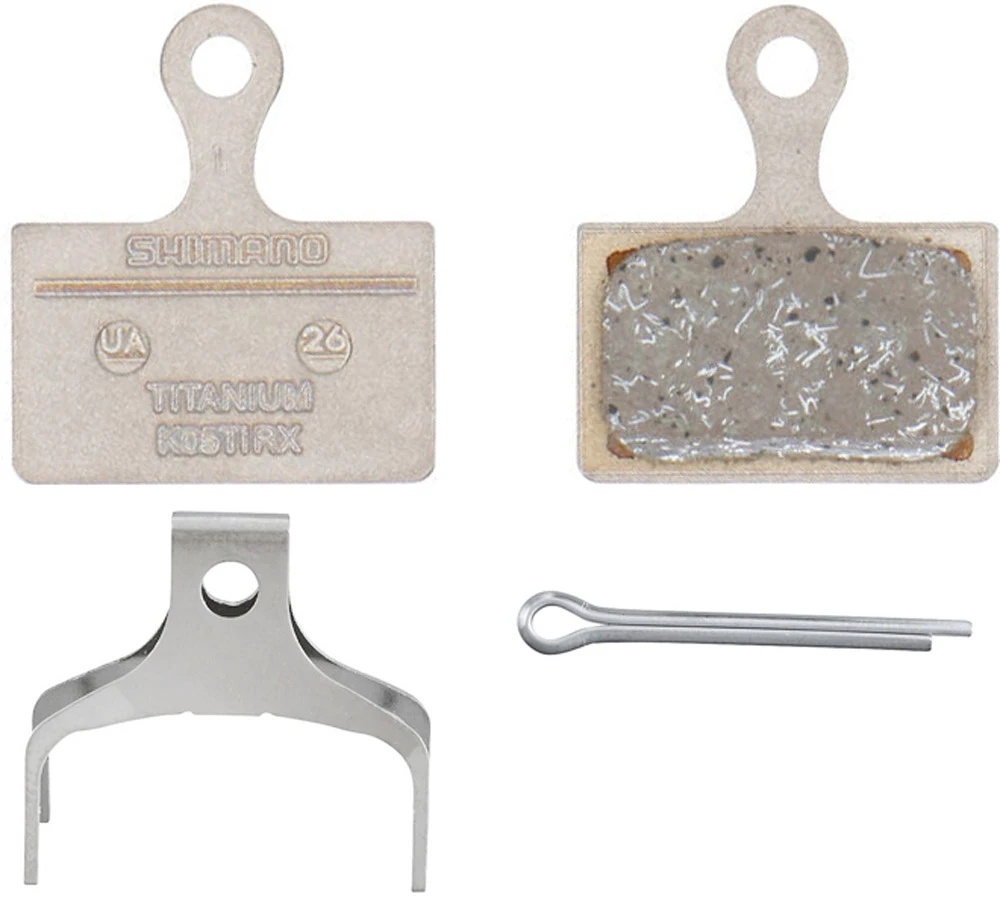 1. Placute de Frana Shimano K05TI-RX, Resin, Fara Aripioare de racire, CU Arc, 1 per