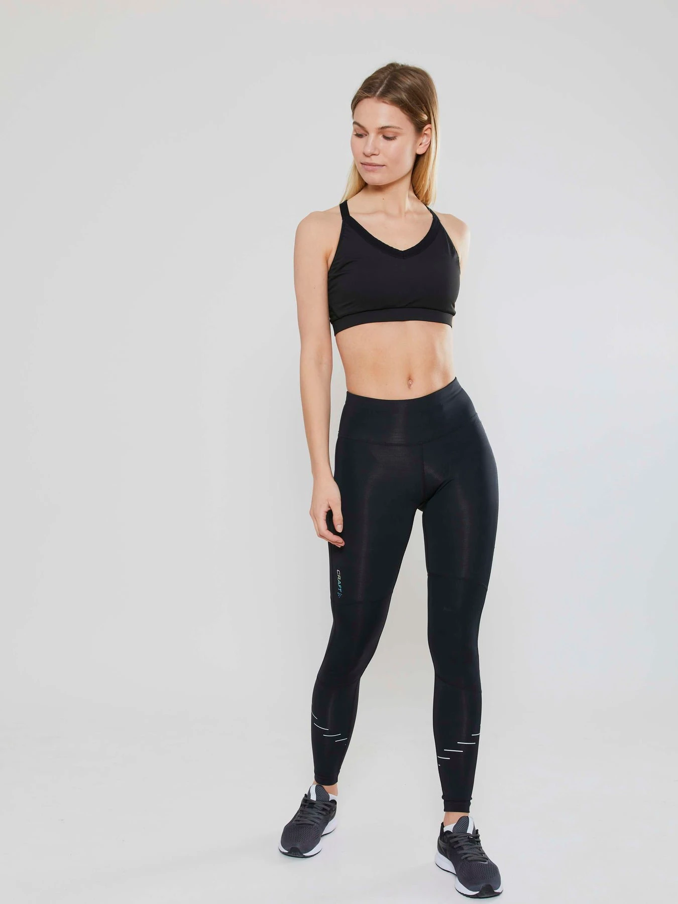 1. Bustieră sport Craft Motion Bra - neagră | strat de bază