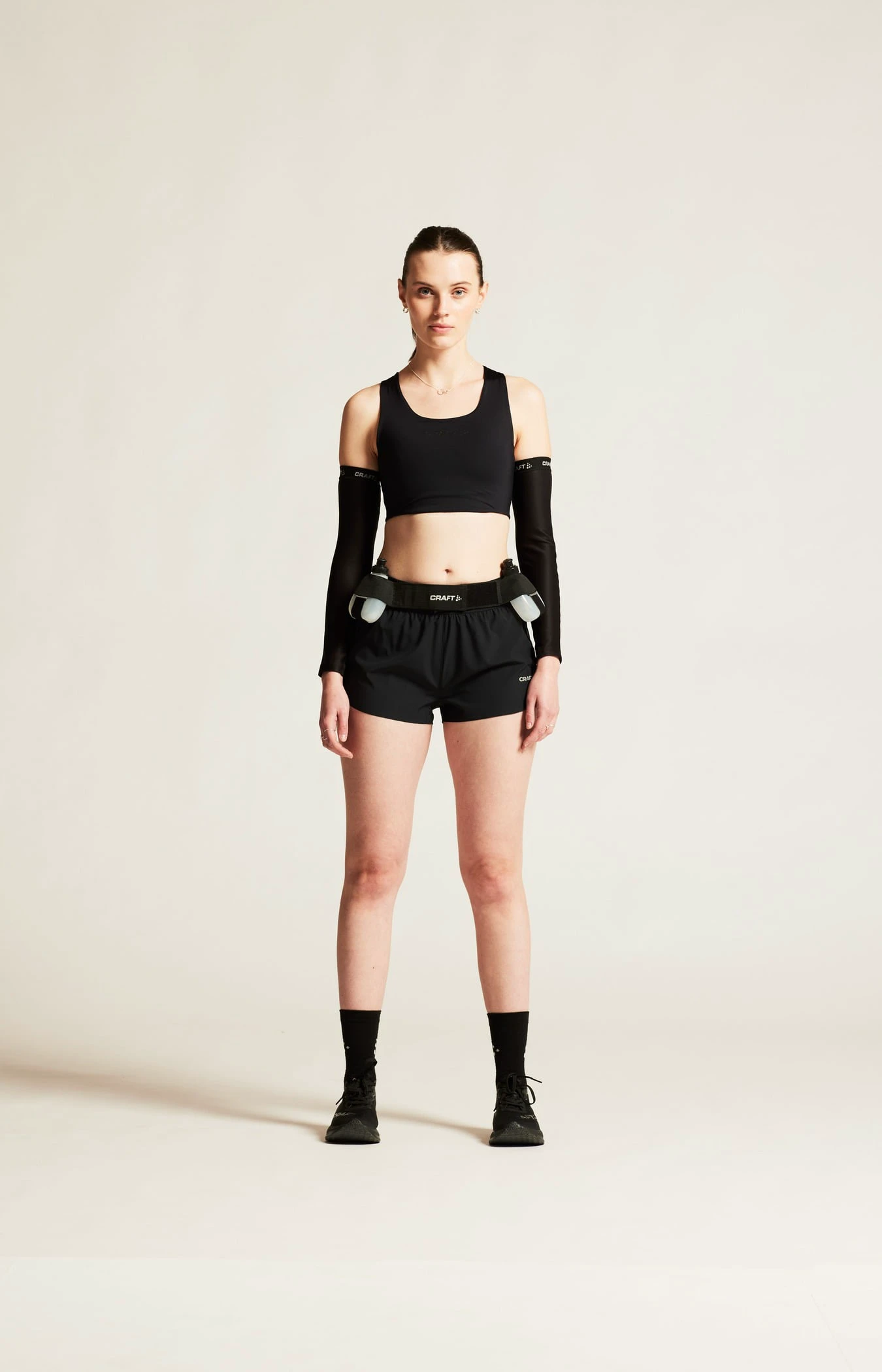 1. Pantaloni scurți alergare Craft ADV Essence 2" Shorts 2 - negri | femei