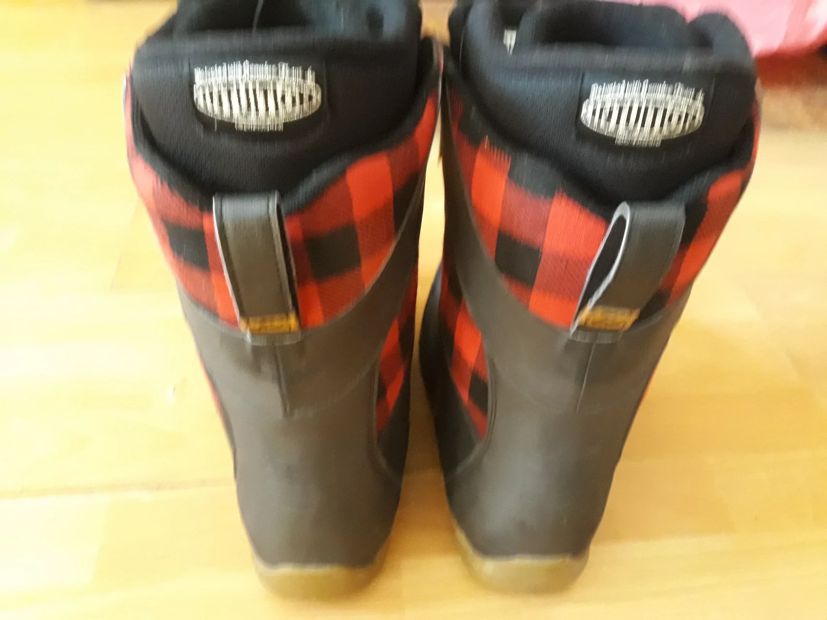 5. Boots Ride snowboard
