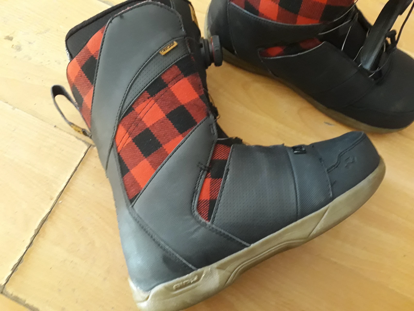 4. Boots Ride snowboard