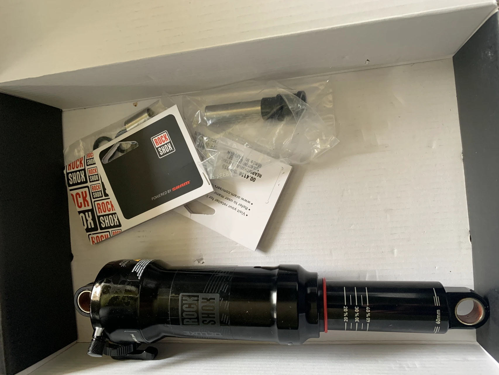 1. Rockshox deluxe rt 230x60metric, standard eyelets.