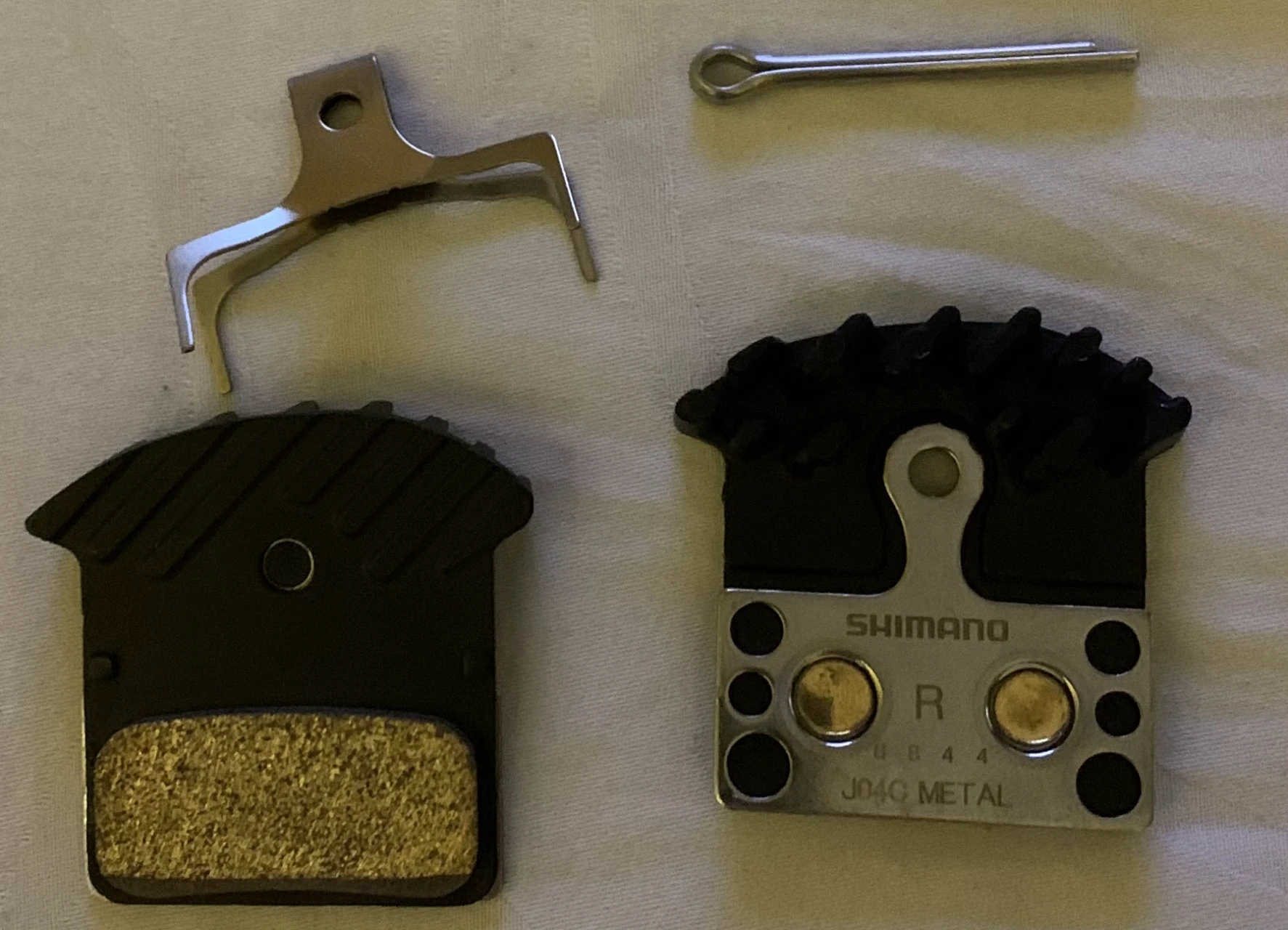 1. Placute metalice Shimano J04C IceTech