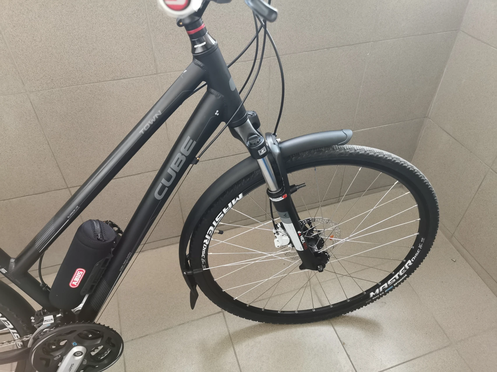 1. Bicicleta CUBE Town GTS trekking/oras, 29" , (dama)