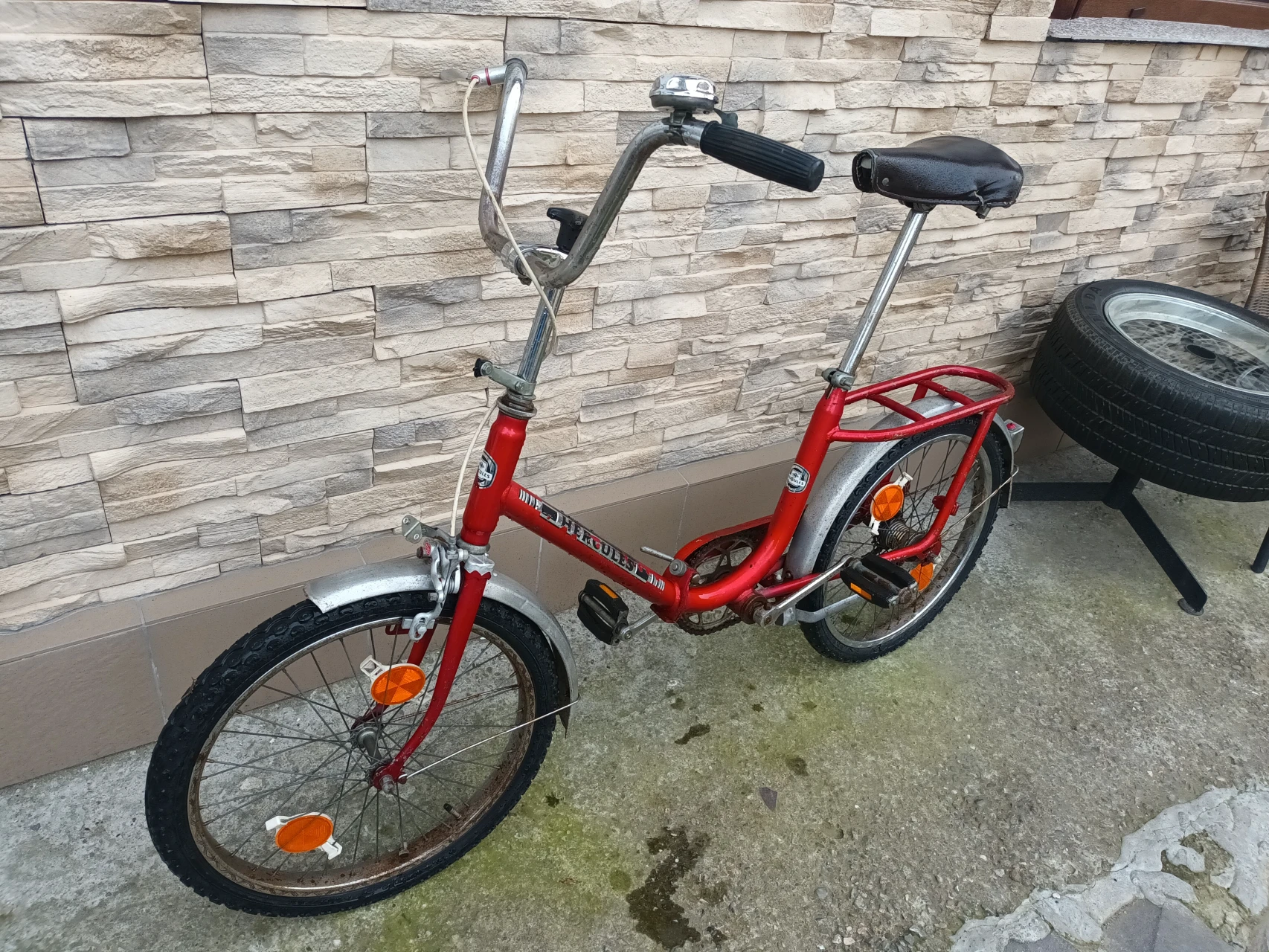 7. Bicicleta Hercules pliabila decor veche