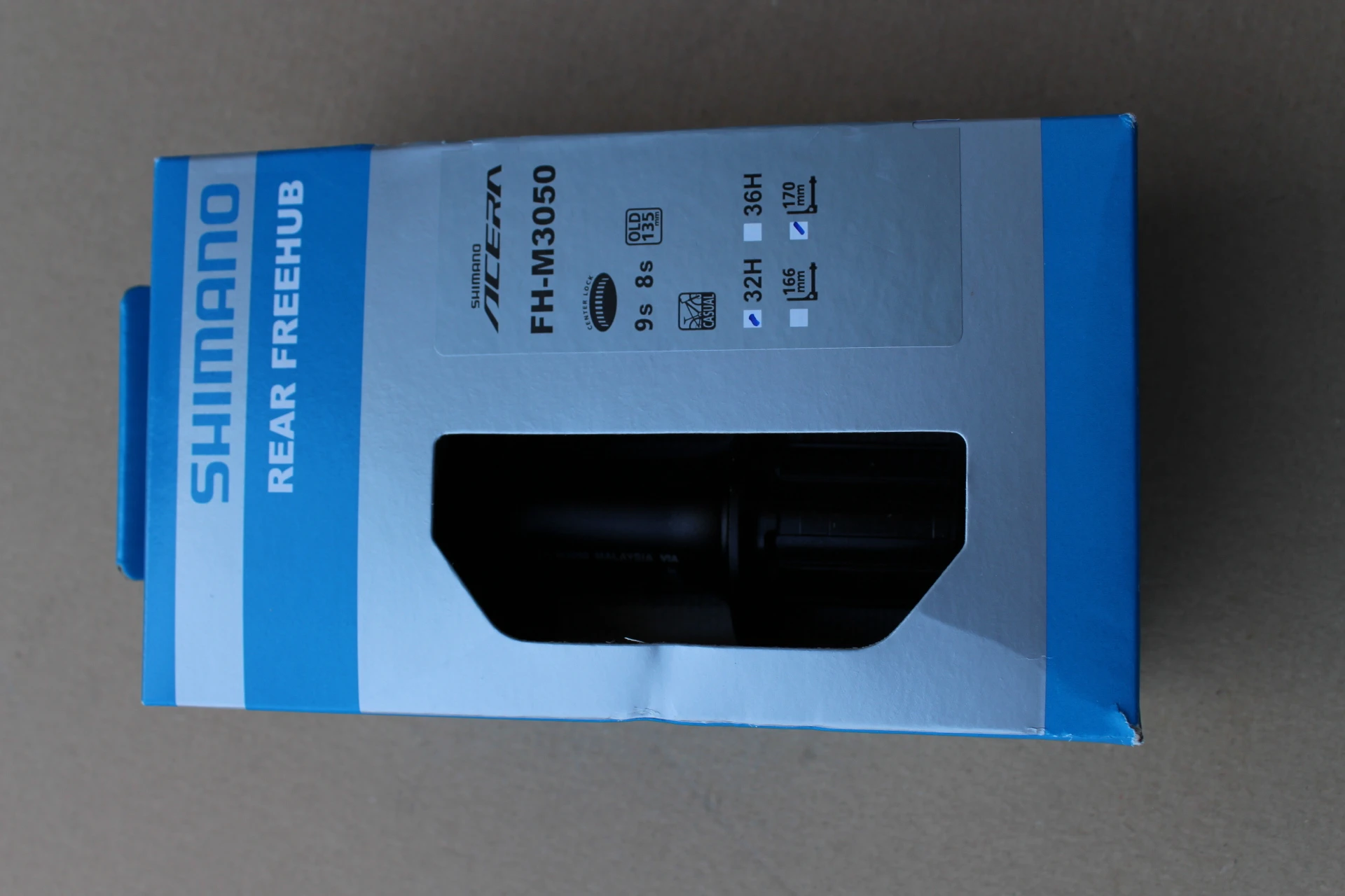 5. Shimano FH-M3050 CenterLock Disc butuc spate + QR 32 gauri