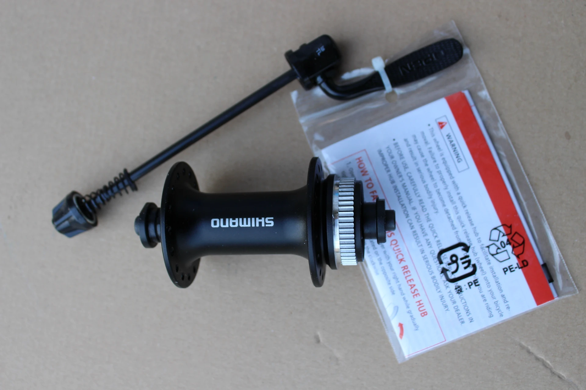 5. Shimano HB-M3050 CenterLock Disc butuc fata + QR 32 gauri