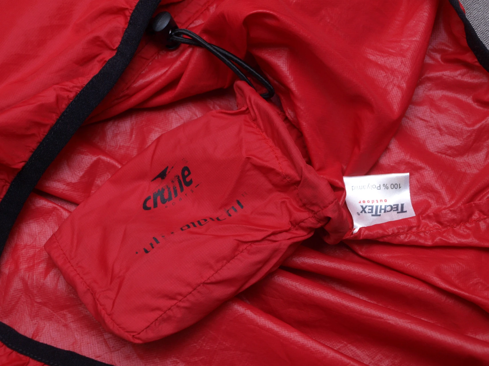 1. Jacheta foita Crane packable S