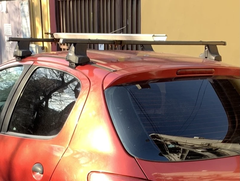 1. Bare Transversale Thule peugeot 206