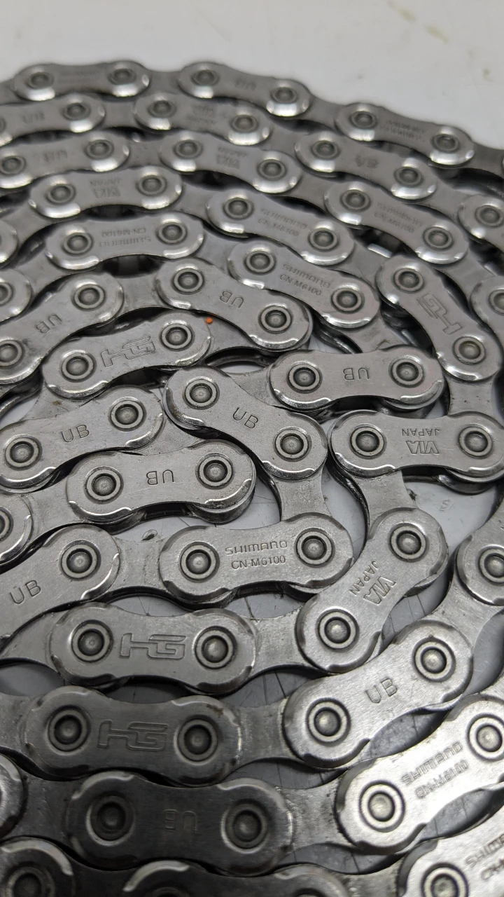 1. Lanț NOU Shimano M8100 12 vit